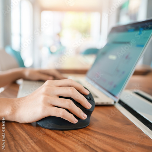 woman hand using computer ergonomic mouse, prevention wrist pain because working long time. De Quervain s tenosynovitis, Intersection Symptom, Carpal Tunnel Syndrome or Office syndrome concept photo