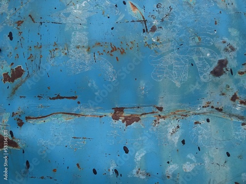 The texture of an old and rusted blue steel plate is used as a design background © Kwang Gallery