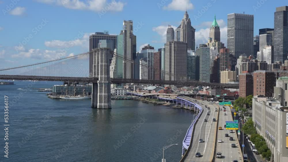 Landmarks of New York City, 2022. 4K video with the traffic on Roosevelt East River Drive (FDR) highway street. Manhattan skyscraper office buildings in background. Landmarks of New York City, 2022. 4K video with the traffic on Roosevelt East River Drive (FDR) highway street. Manhattan skyscraper office buildings in background.