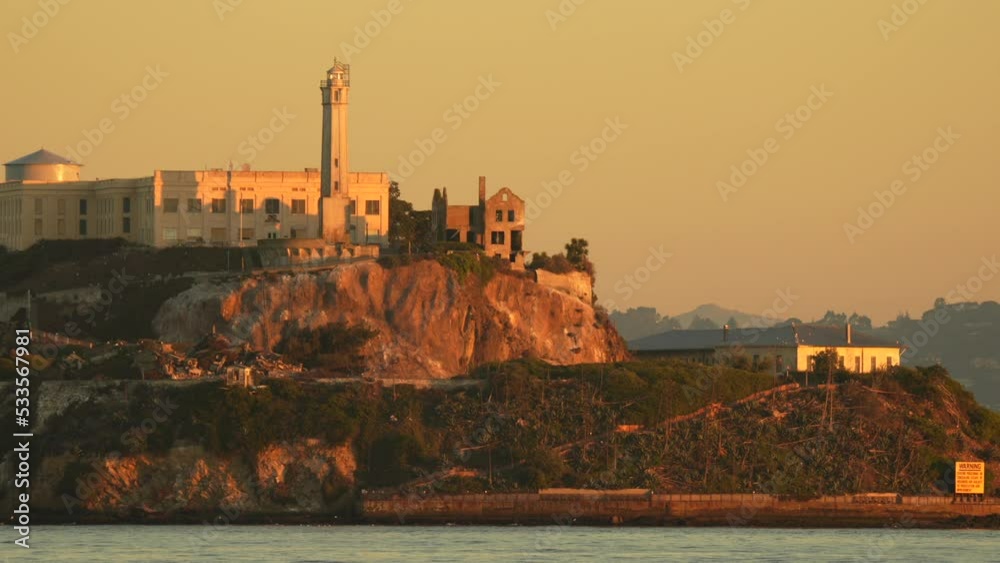 Iconic landmark Alcatraz prison from San Francisco in a 4K video filmed during the sunrise. 
