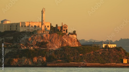 Iconic landmark Alcatraz prison from San Francisco in a 4K video filmed during the sunrise. 