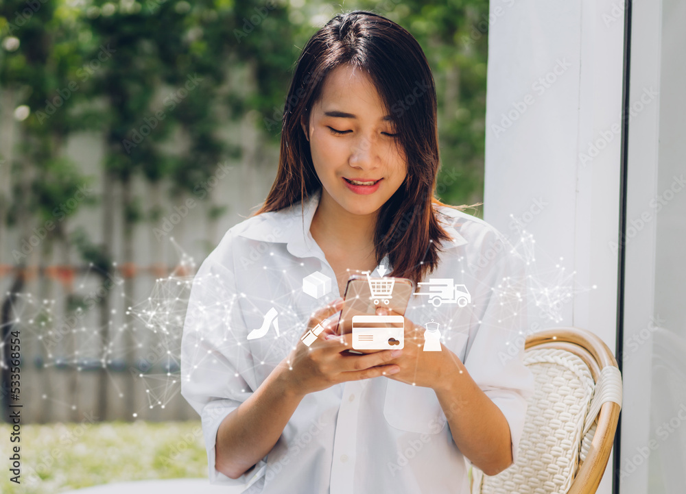 Portrait of woman relax use technology of smartphone for fashion online shopping.Young girl shopping summer sale and buy internet banking something purchases at home.e-commerce concept Portrait of woman relax use technology of smartphone for fashion online shopping.Young girl shopping summer sale and buy internet banking something purchases at home.e-commerce concept