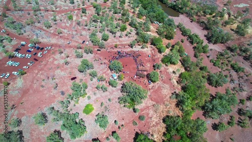 Circling aerial view of the cermony at the start of the Freedom Day Festival at Kalkaringi, Northern Territory, Australia. 26 August 2022. photo