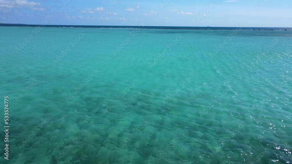 Beautiful aerial view of Boca Chica beach, its turquoise waters, resorts near the Santo Domingo Airport in Dominican Republic Beautiful aerial view of Boca Chica beach, its turquoise waters, resorts near the Santo Domingo Airport in Dominican Republic