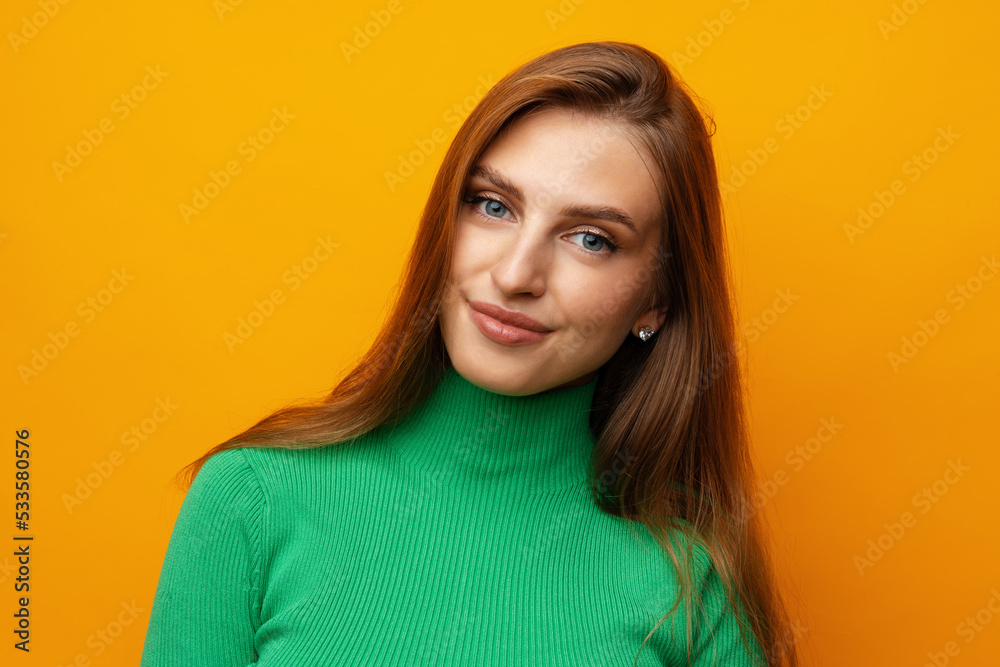 Pretty young woman smiling over yellow isolated background Pretty young woman smiling over yellow isolated background