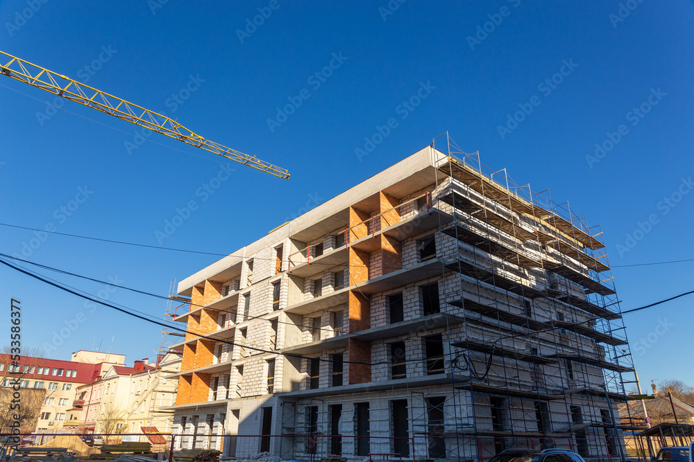 Insulation of the exterior walls of a building under construction. Insulation of the exterior walls of a building under construction.