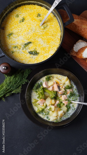 Creamy fish soup with salmon, potatoes, onions , carrots, dill and broccoli. Kalakeitto- traditional dish of the Finnish cuisine. Healthy Food Concept. Omega -3