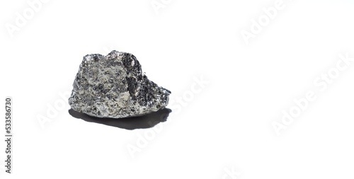 Pyrite is a mineral from the group of sulfides whose chemical formula is FeS2. It is made up of sulfur and iron. Isolated photo on white background
