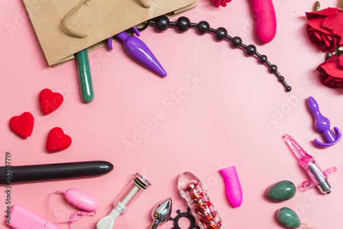 Adult sex toy on pink background