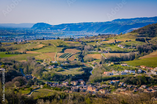 View on Crozes-Hemritage small village, the Rhone Valley vineyards and the Ardeche mountains from the Mejeans belvedere (Drome, France)