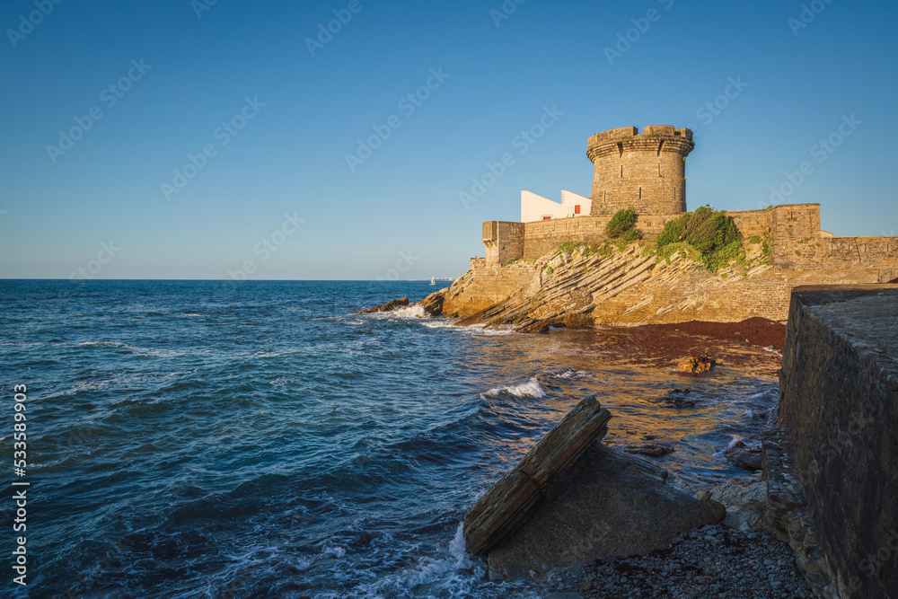 Fort de Socoa at sunset, with unique flysch landform in Ciboure and Saint-Jean-de-Luz Fort de Socoa at sunset, with unique flysch landform in Ciboure and Saint-Jean-de-Luz