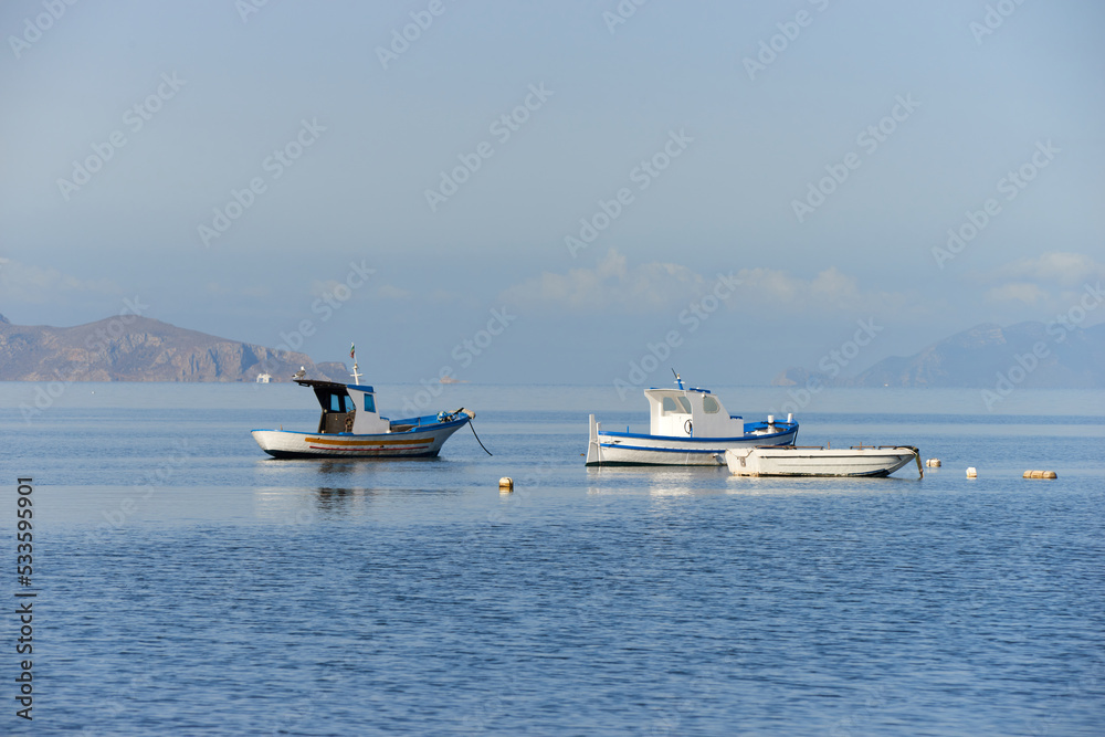 fishing boats and boats to the Egadi islands with calm sea and clear day