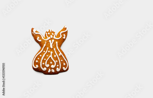 isolated gingerbread cookies man angels on green background natural green fir pine cone branches orange fruit dry slices.mockup banner free space for text.christmas eve, offers sale promotions.winter 