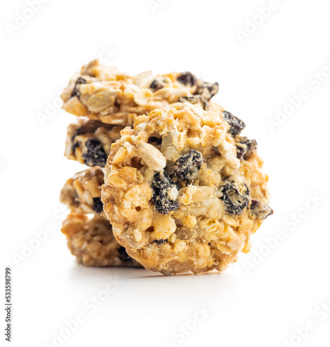 Wholegrain oat cookies. Cookies with oatmeal and raisins isolated on white table.