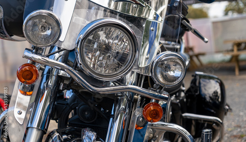 Close-up view of classic motorcycle headlights © Gints 