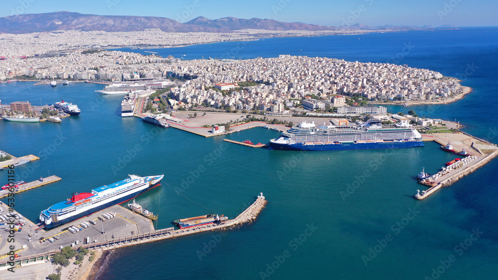 Aerial drone photo of famous and busy port of Piraeus where passenger ferries travel to Aegean destination islands, Attica, Greece