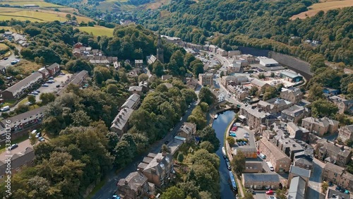 Aerial footage of Todmorden a small market town with a big industrial history.
Nestled in the Pennine hills Todmorden is an ideal base for walking, with canals and longboats, barges. photo