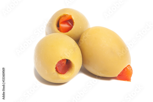 Green olives stuffed with sweet peppers isolated on a white background
