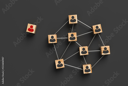 Wooden blocks with people icon on a gray background. Society concept. 3D rendering.
