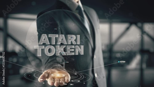 Atari Token with hologram businessman concept photo