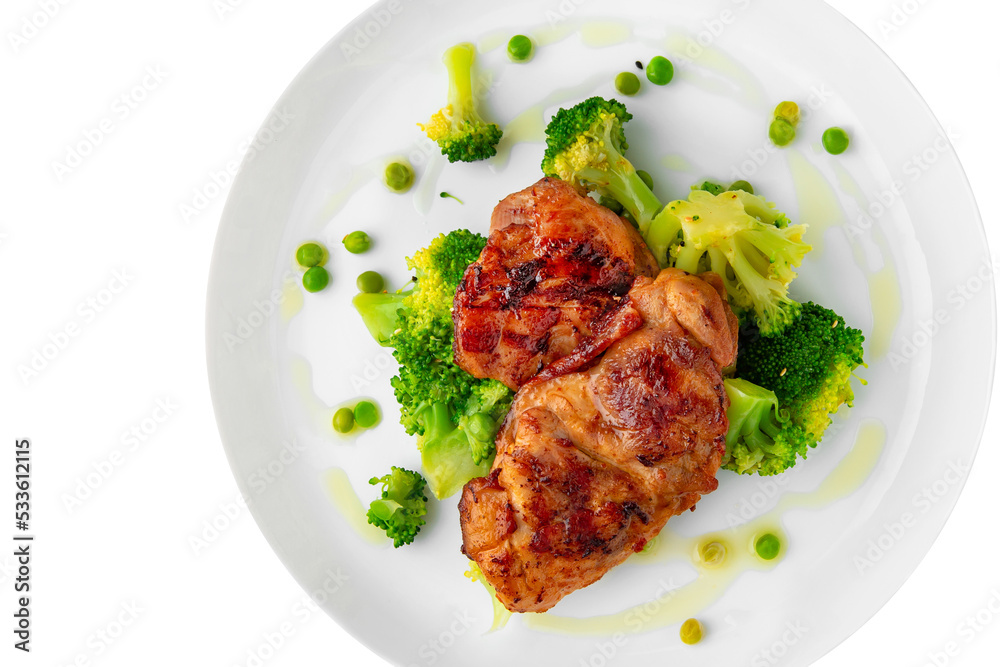 Steak with chicken or turkey with vegetables. Balanced, nutritious, tasty and nutritious food. Ready-made menu for a restaurant or for delivery. Dish in a white plate isolated on a white background. Steak with chicken or turkey with vegetables. Balanced, nutritious, tasty and nutritious food. Ready-made menu for a restaurant or for delivery. Dish in a white plate isolated on a white background.