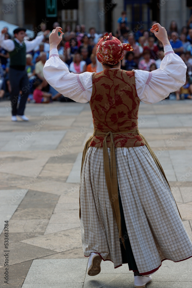 Basque folk dancers in a street festival Basque folk dancers in a street festival