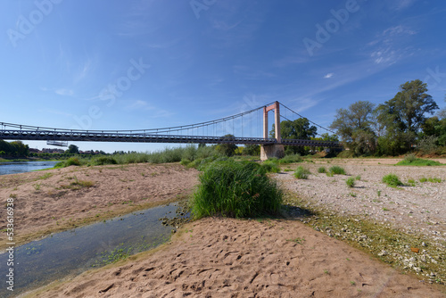 Dry Loire riverbed and Cosne-Cours-sur-Loire bridge photo