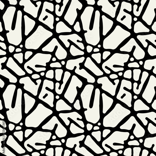 Vector seamless pattern. Free form organic shapes. Stylish structure of natural spots. Hand drawn abstract background. Can be used as swatch in Illustrator. Monochrome spotty print. photo