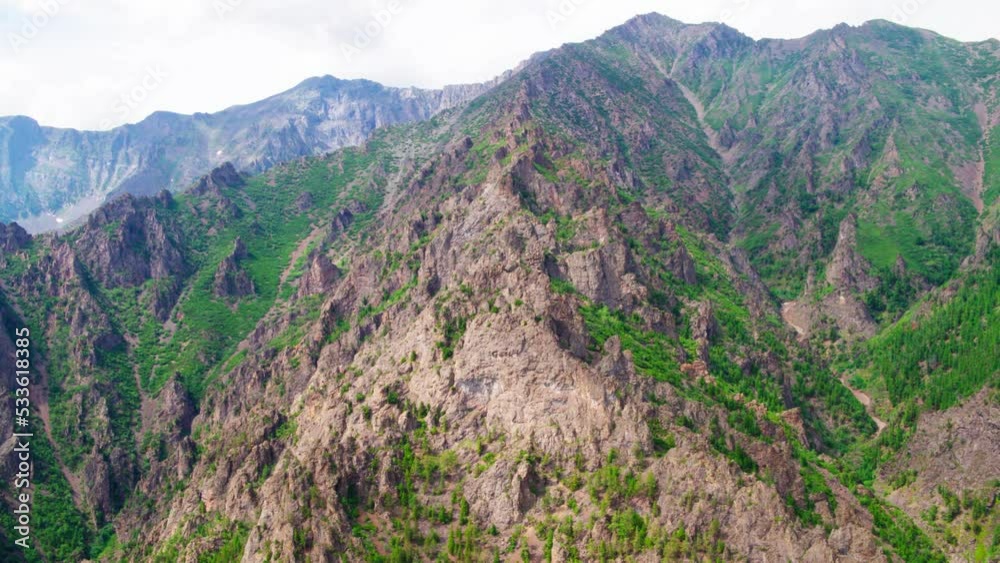 Siberian Mountains in Taiga on the shore of Lake Baikal. Shooting from a drone Siberian Mountains in Taiga on the shore of Lake Baikal. Shooting from a drone