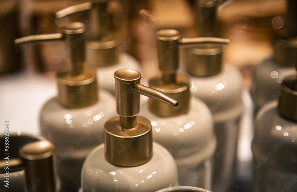 Close-up, bottles with dispensers for liquid soap. Close-up, bottles with dispensers for liquid soap.
