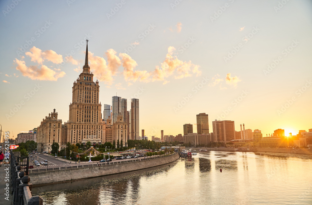 Moscow, Russia - 30.07.2022: View of the Ukraine Hotel, the Moscow City business center and the Moscow River