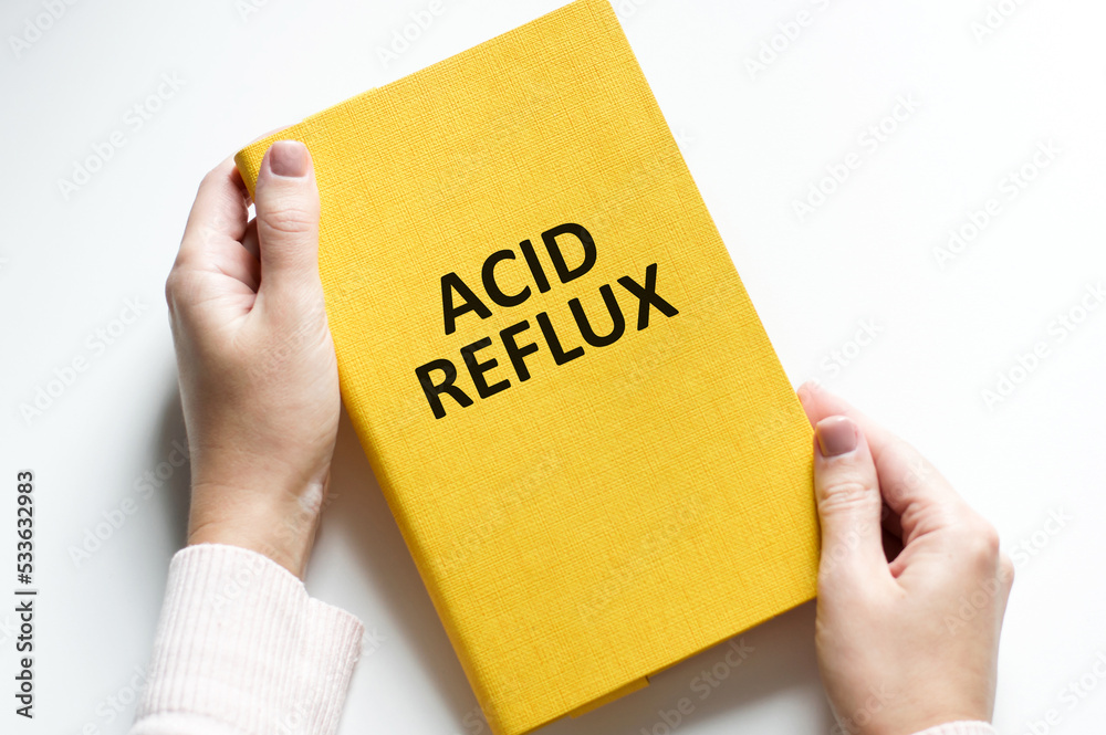 Doctor hand touching acid reflux sign on virtual screen. medical concept Doctor hand touching acid reflux sign on virtual screen. medical concept