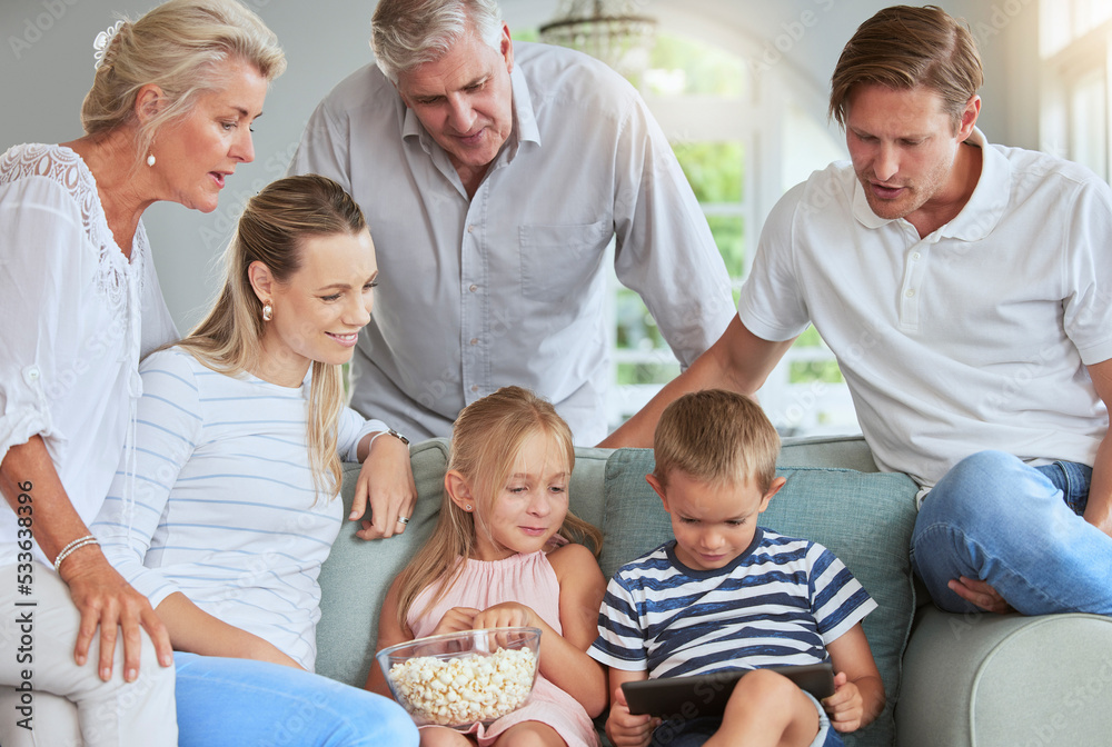 Streaming, media and family watch tablet movies entertainment on internet mobile app together in living room. Happy family people love watching online reunion film series on technology in home lounge