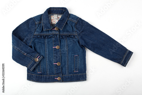 Stylish blue jeans jacket. Clothes for kids photo