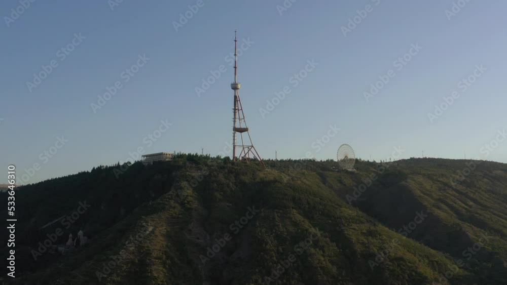 sunny evening tbilisi city famous mountain top park tower ferris wheel aerial panorama 4k georgia sunny evening tbilisi city famous mountain top park tower ferris wheel aerial panorama 4k georgia