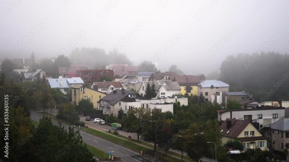 Suburbs covered in fog. Birds eye view. Suburbs covered in fog. Birds eye view.