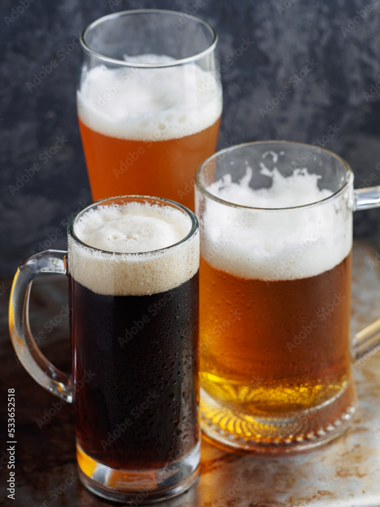 Three beers on the table. Various draft beer Three beers on the table. Various draft beer