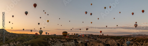 Sunrise with hot air balloons in Cappadocia, Turkey balloons in Cappadocia Goreme Kapadokya, and Sunrise in the mountains of Cappadocia. 
