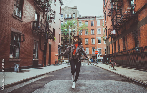 Beautiful girl walking in New york city, concept about new yorkers and lifestyle photo