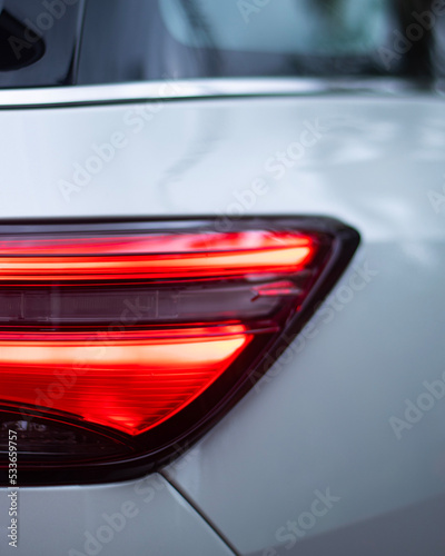 A picture showing lit tail light of a car in traffic © Arjun