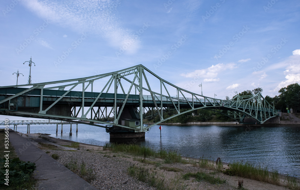 Liepaja, Latvia - August 19, 2022: Beautiful scenery of Liepaja town and surroundings in Latvia during a summer sunny day.  Oskara Kalpaka Bridge. Selective focus.