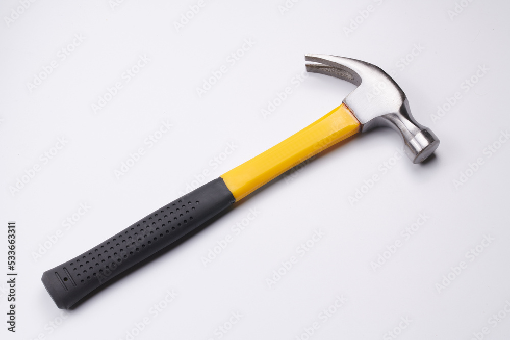 Yellow construction hammer isolated on white background closeup Yellow construction hammer isolated on white background closeup