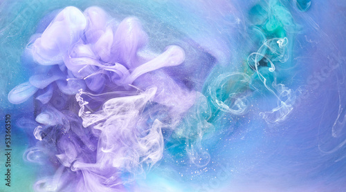 Purple lilac multicolored smoke abstract background, acrylic paint underwater explosion
