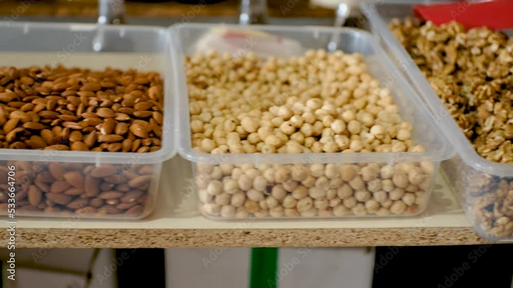 Showcase of various nuts on oriental bazaar. Georgian market. Showcase of various nuts on oriental bazaar. Georgian market.