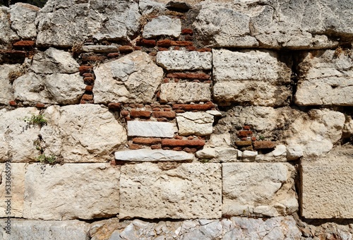 Texture of ancient stone wall at Acropolis, Athens, Greece