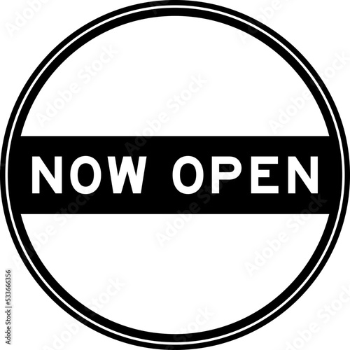 Black color round seal sticker in word now open on white background
