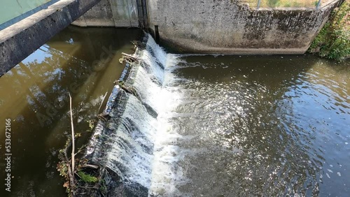 Flown over an artificially created waterfall from a stream in Bavaria