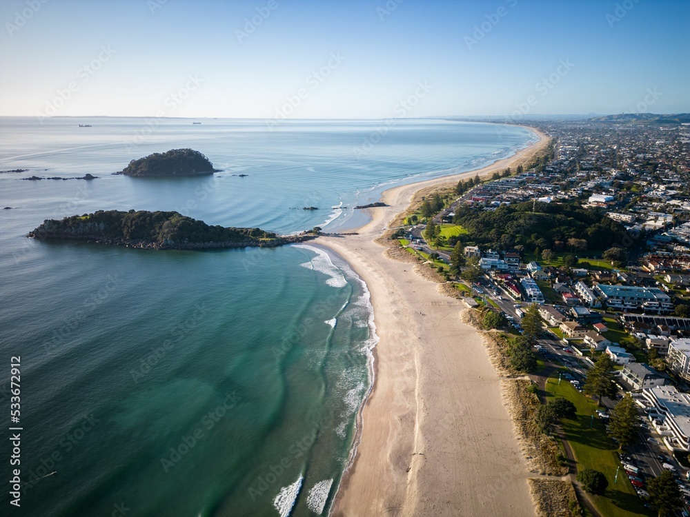 Obraz premium Aerial view of Mount Maunganui with Bay of Plenty and modern buildings, Tauranga, New Zealand