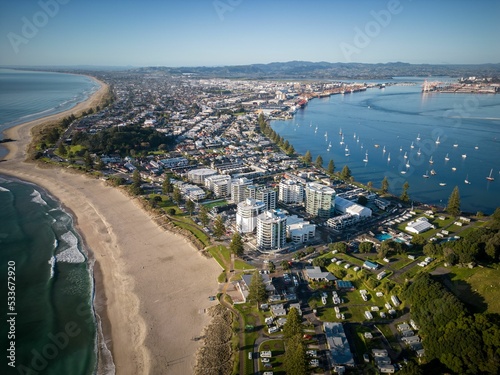 Aerial view of Mount Maunganui with Bay of Plenty and modern buildings, Tauranga, New Zealand photo