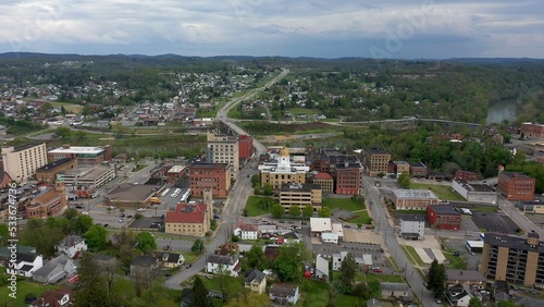 Wide angle view of the Marion County courthouse in Fairmont, WV, and the surrounding small town river and countryside in the appalachian mountains.